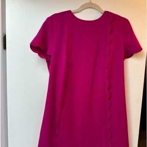 Tahari scalloped design in front . Great for an event or work . Worn one time